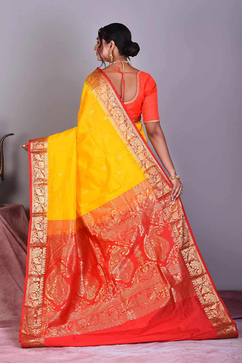 Yellow Pure Kanjivaram Saree with Red Borders - Keya Seth Exclusive