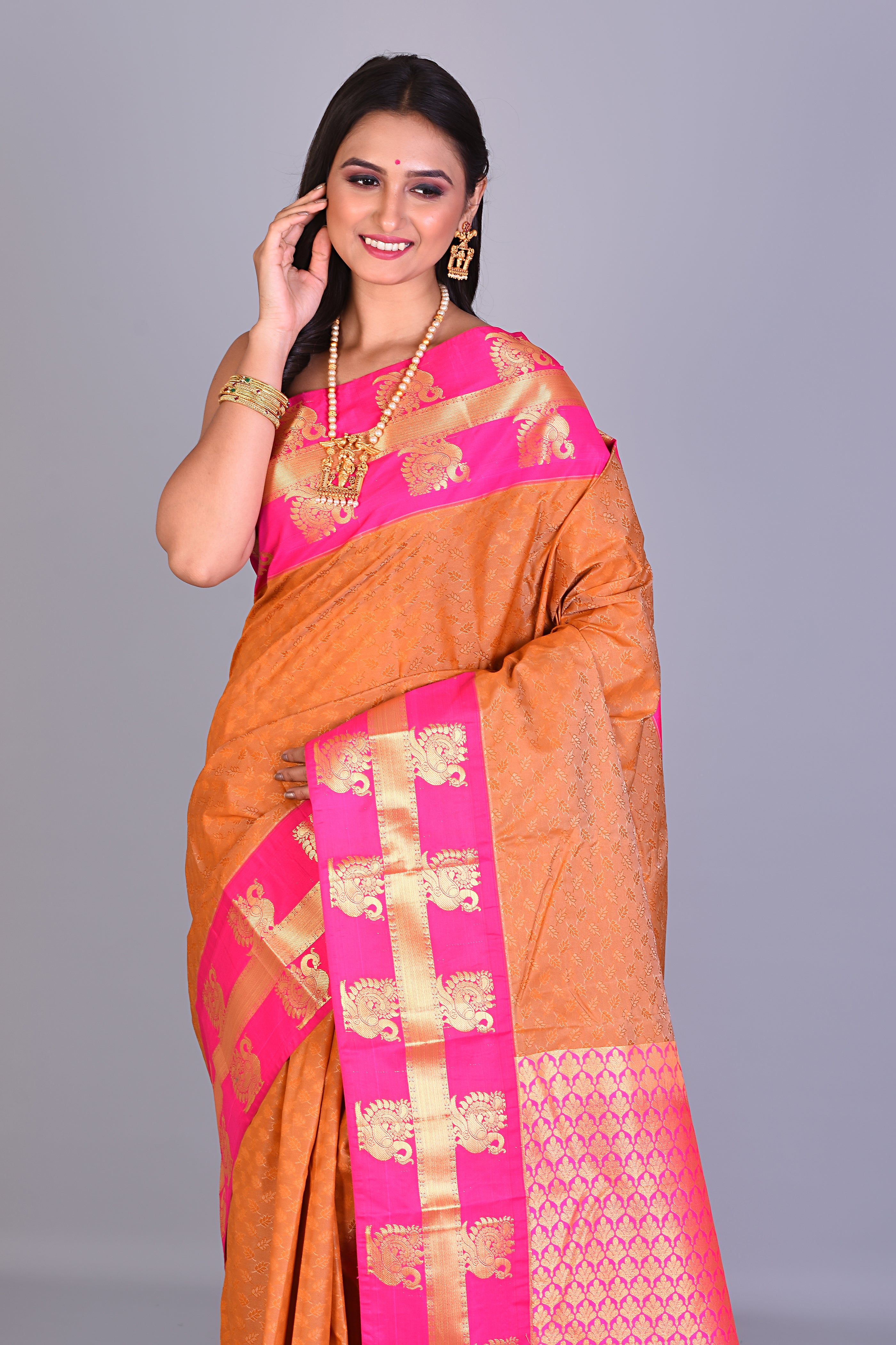 Orange Pattu Silk Saree with Pink Borders - Keya Seth Exclusive