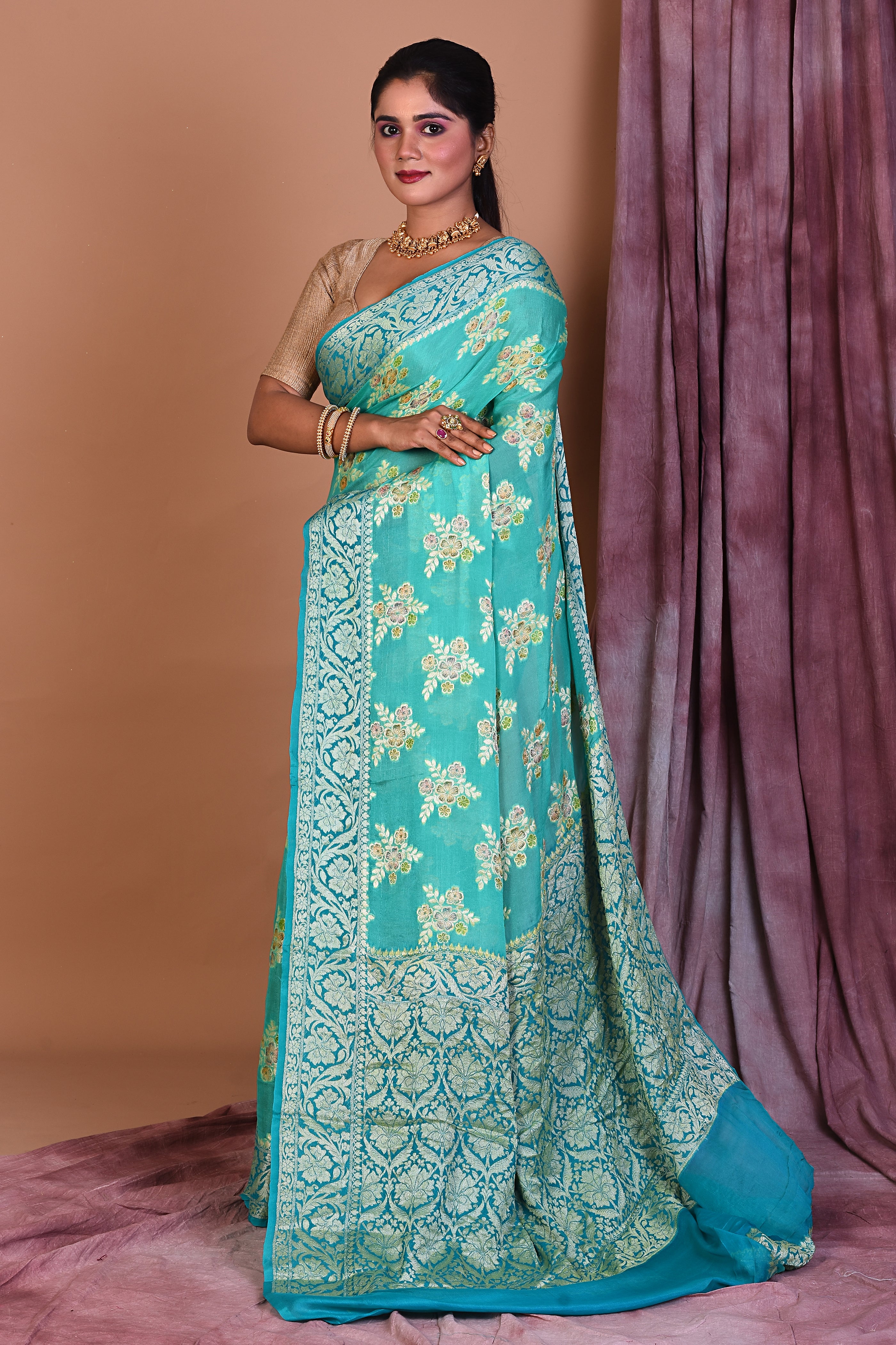 Light Green Khaddi Georgette Saree with Golden Borders - Keya Seth Exclusive