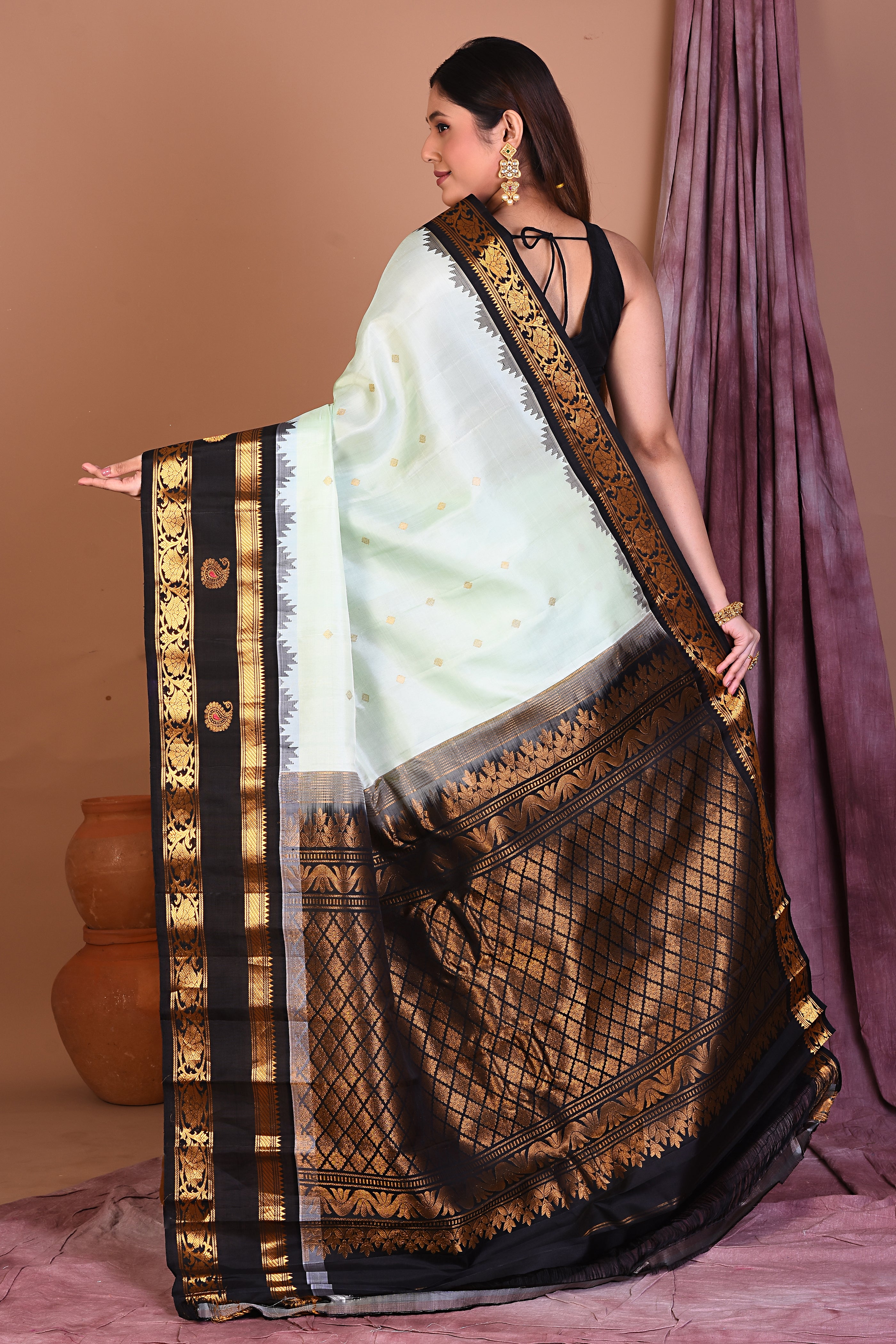 Sea Green Pure Gadwal Saree with Black Borders - Keya Seth Exclusive