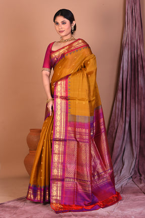 Mustard Pure Gadwal Saree with Magenta Borders - Keya Seth Exclusive