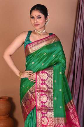 Green Pure Kanjivaram Saree with Magenta Borders - Keya Seth Exclusive