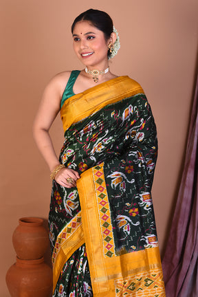 Bottle Green Pure Ikkat Saree with Yellow Borders - Keya Seth Exclusive