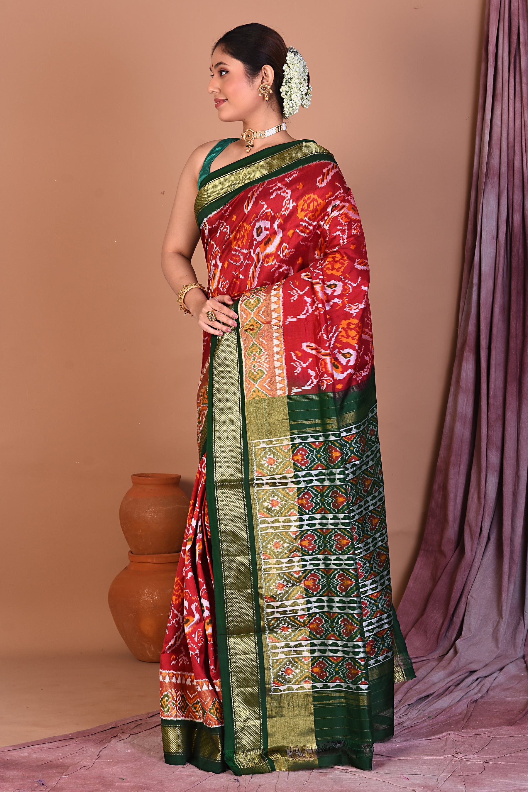 Red Pure Ikkat Saree with Green Borders - Keya Seth Exclusive