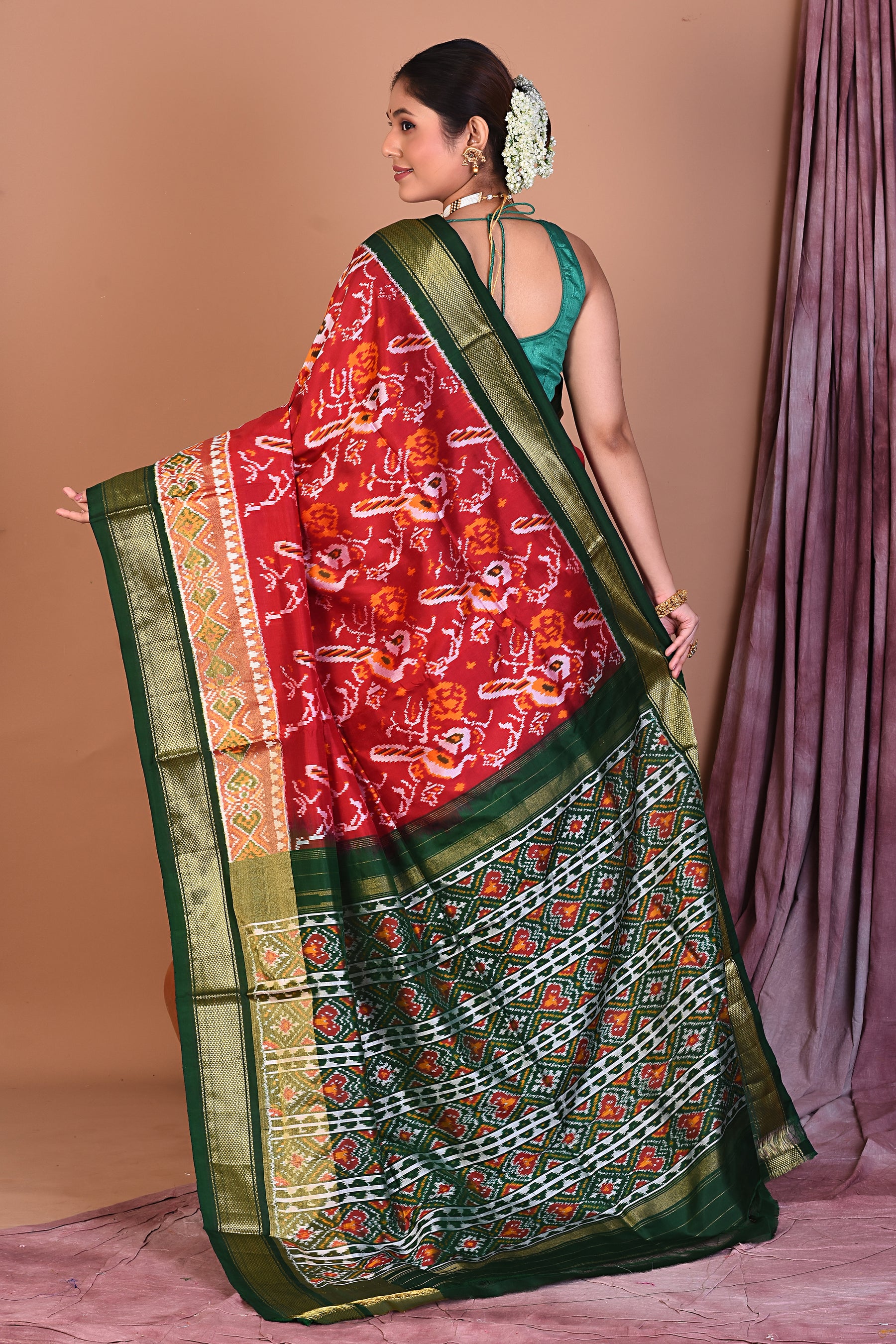 Red Pure Ikkat Saree with Green Borders - Keya Seth Exclusive