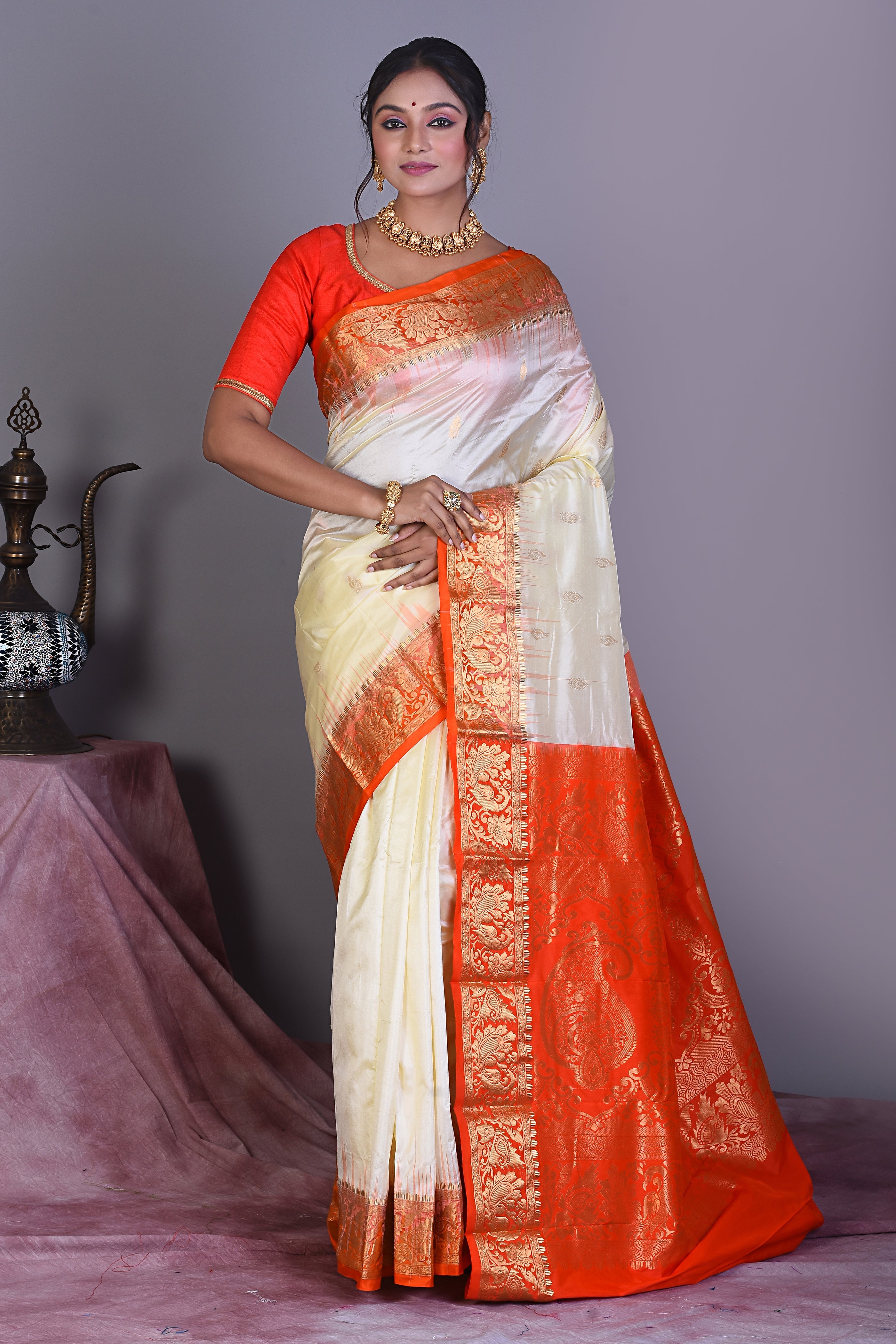 Off-white Pure Kanjivaram Saree with Orange Borders - Keya Seth Exclusive