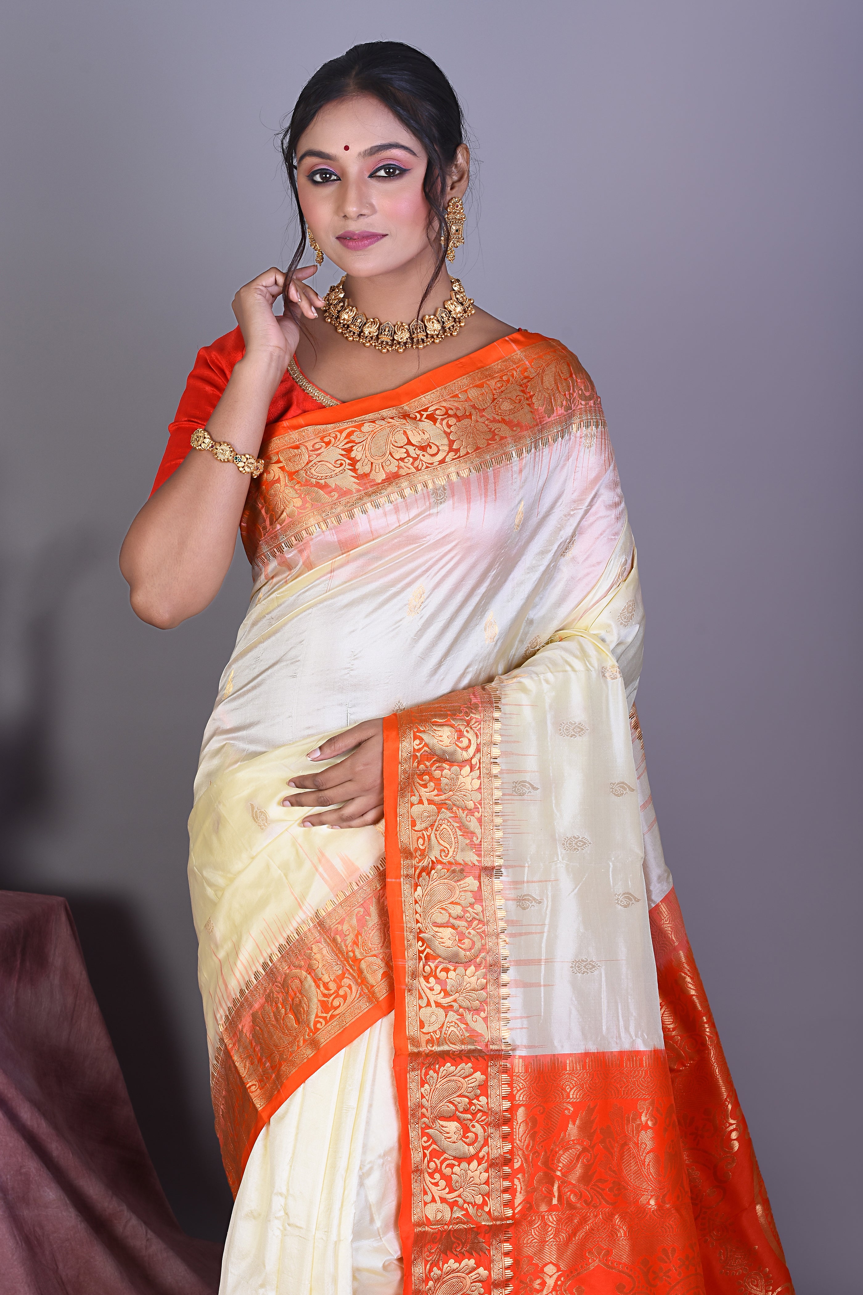 Off-white Pure Kanjivaram Saree with Orange Borders - Keya Seth Exclusive