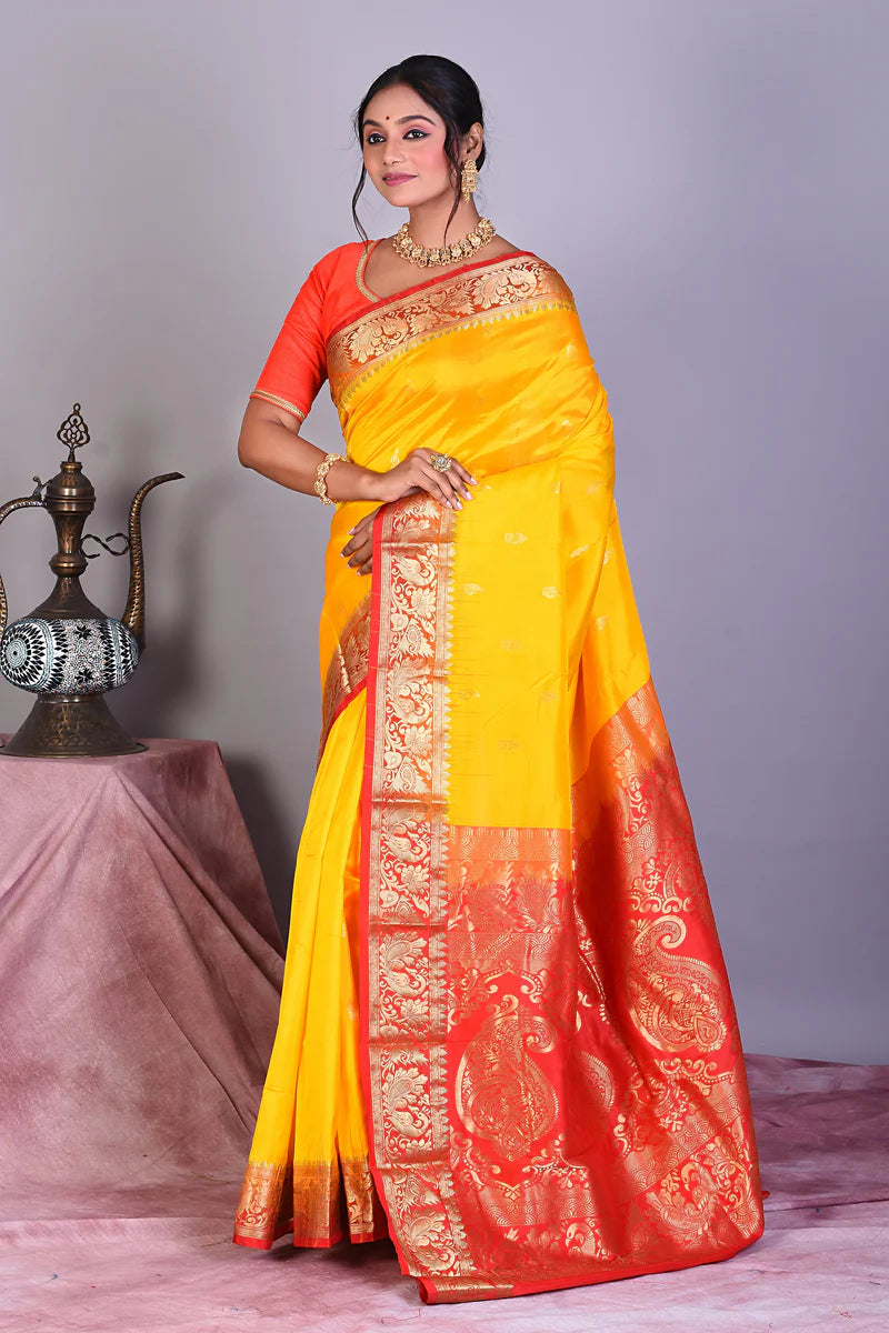 Yellow Pure Kanjivaram Saree with Red Borders - Keya Seth Exclusive