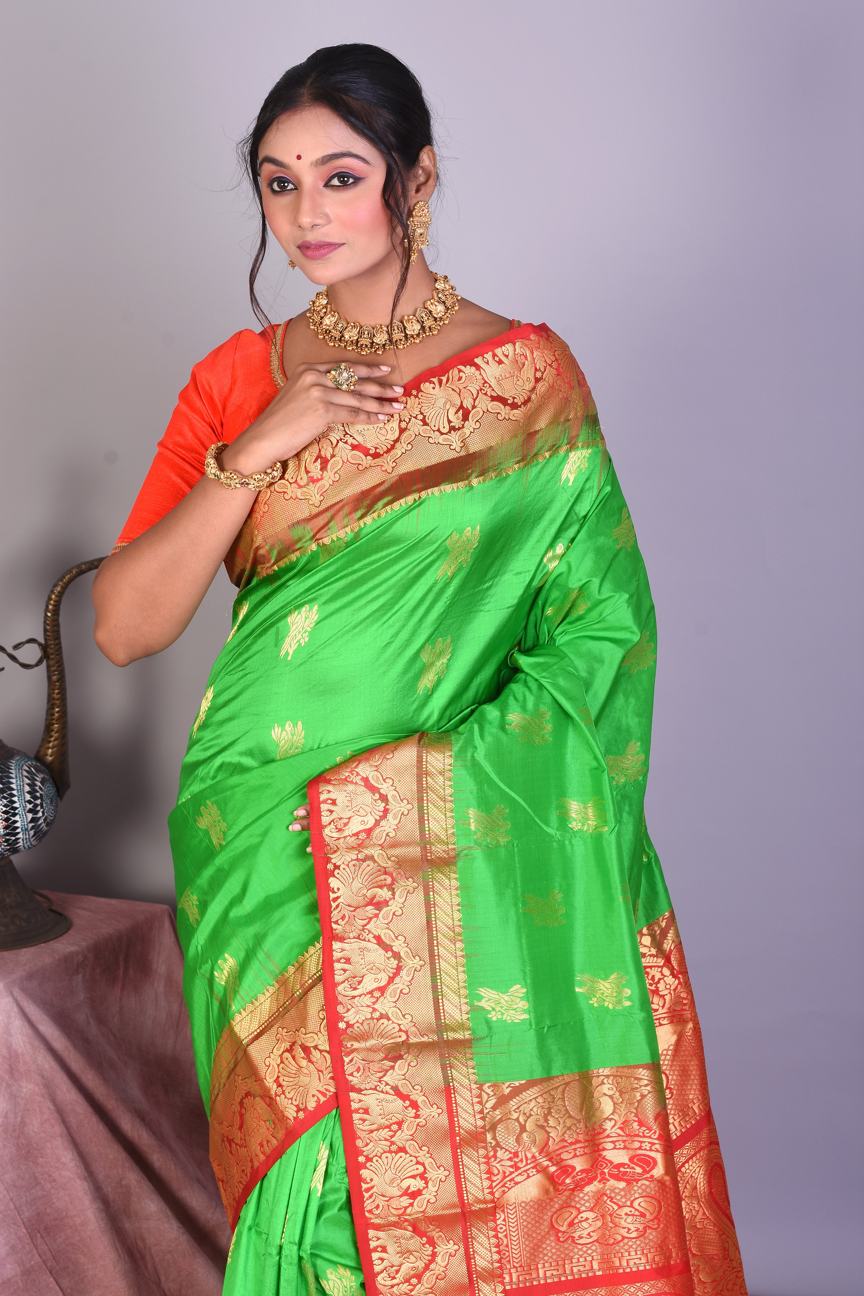 Bright Green Pure Kanjivaram Saree with Red Borders - Keya Seth Exclusive