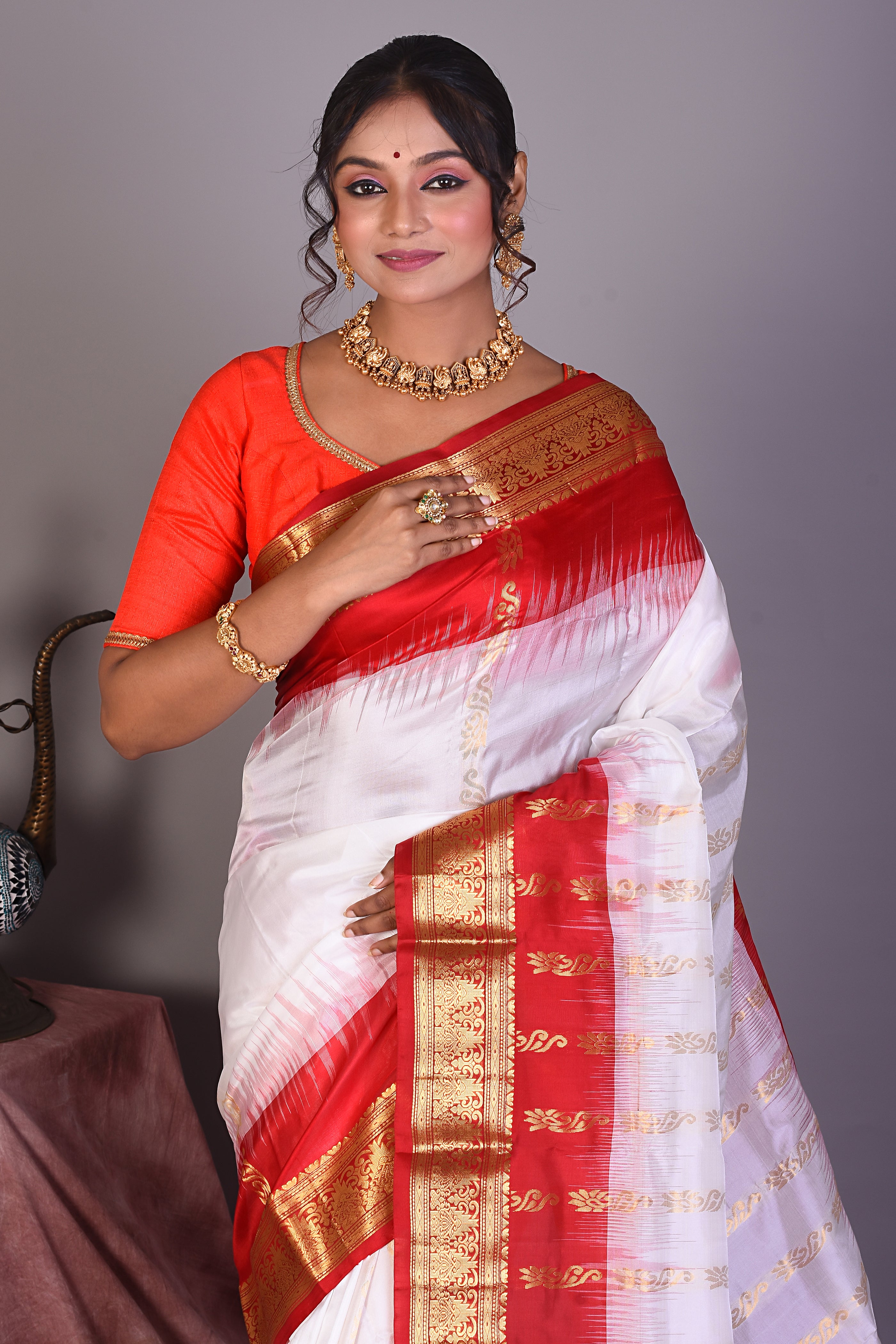 White Pure Kanjivaram Saree with Red Borders - Keya Seth Exclusive