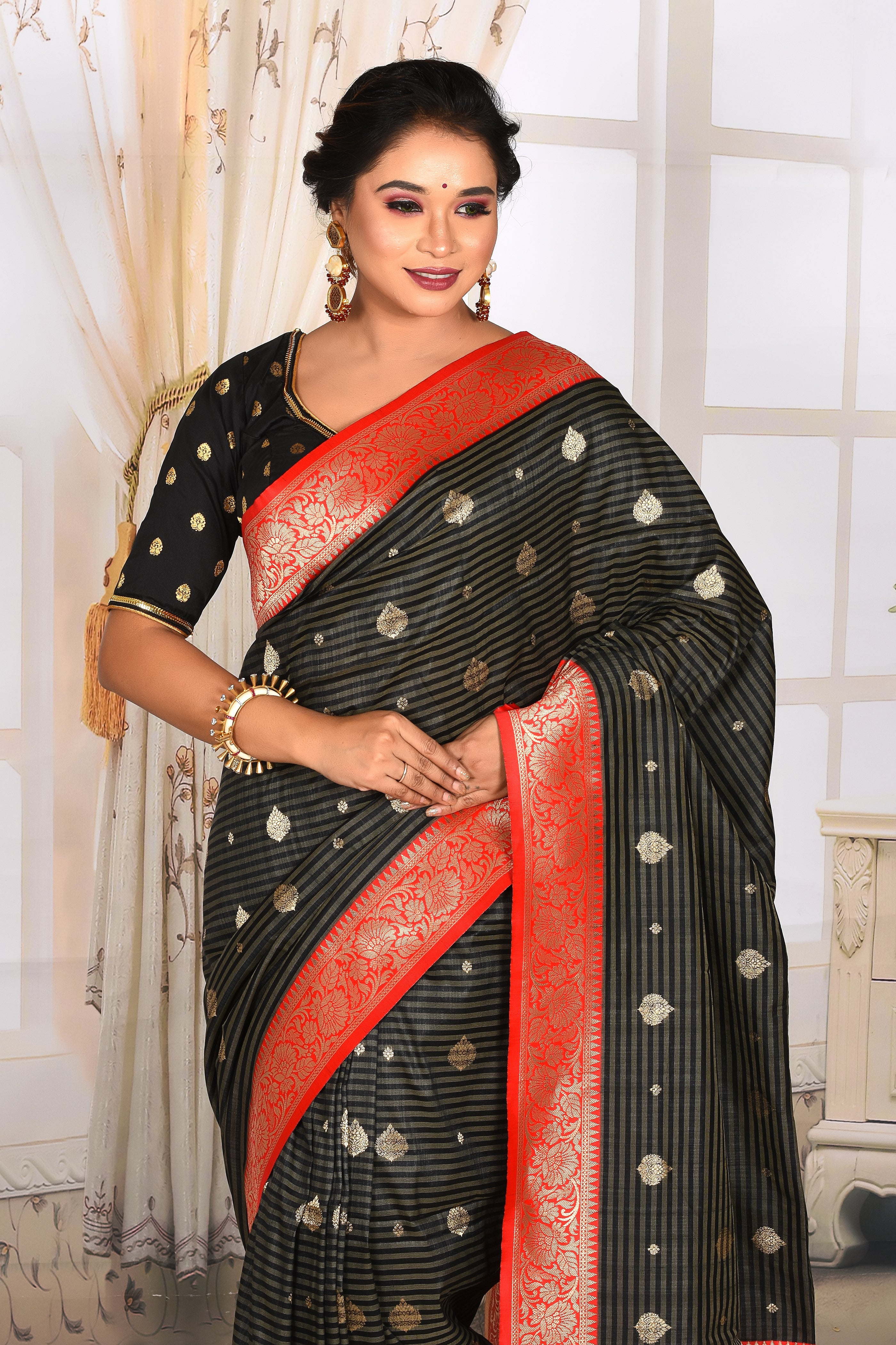 Shiny Bright Black Semi Tussar Saree with Red Border - Keya Seth Exclusive