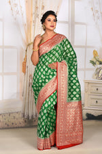 Load image into Gallery viewer, Bottle Green Organza Saree with Red Border - Keya Seth Exclusive
