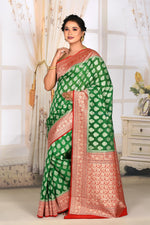 Load image into Gallery viewer, Bottle Green Organza Saree with Red Border - Keya Seth Exclusive
