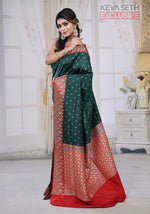 Load image into Gallery viewer, Deep Green Semi Katan Silk with Red Border - Keya Seth Exclusive