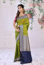Load image into Gallery viewer, Double Tone Green Semi Katan Silk Saree with Blue Border - Keya Seth Exclusive