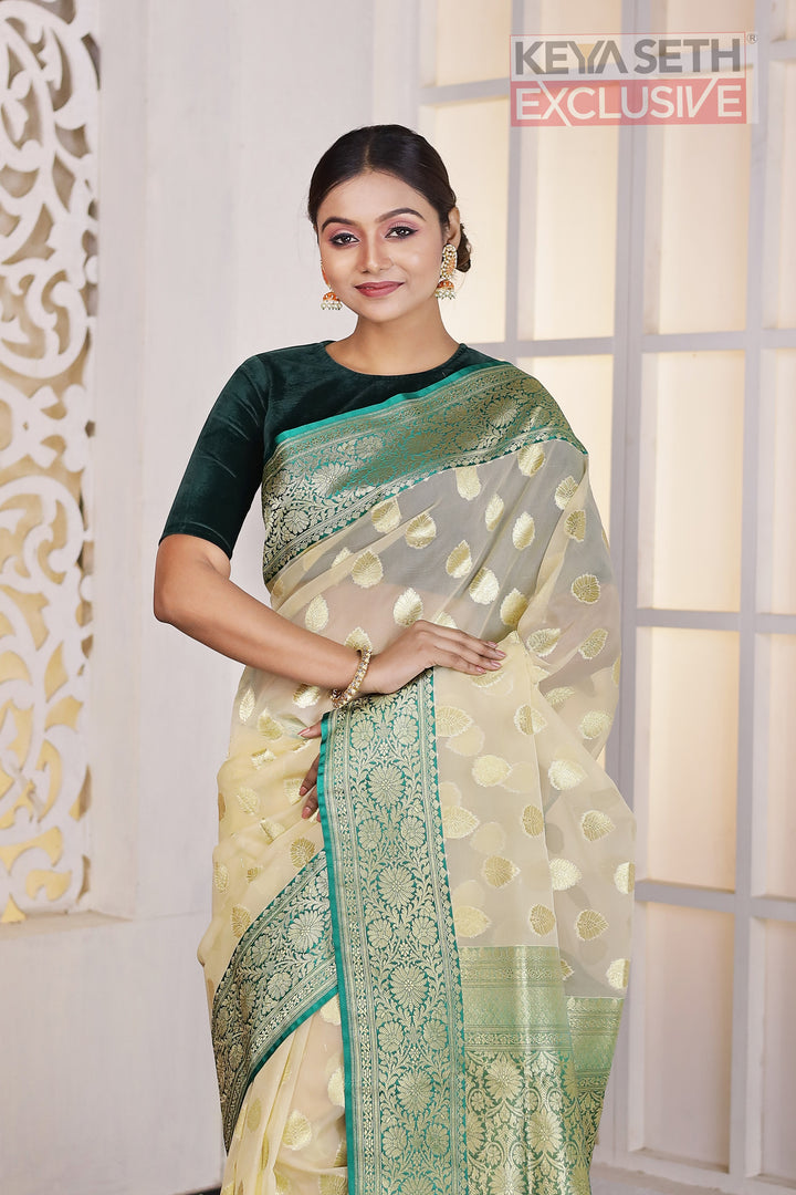 Off-white Soft Tissue Saree with Green Satin border - Keya Seth Exclusive