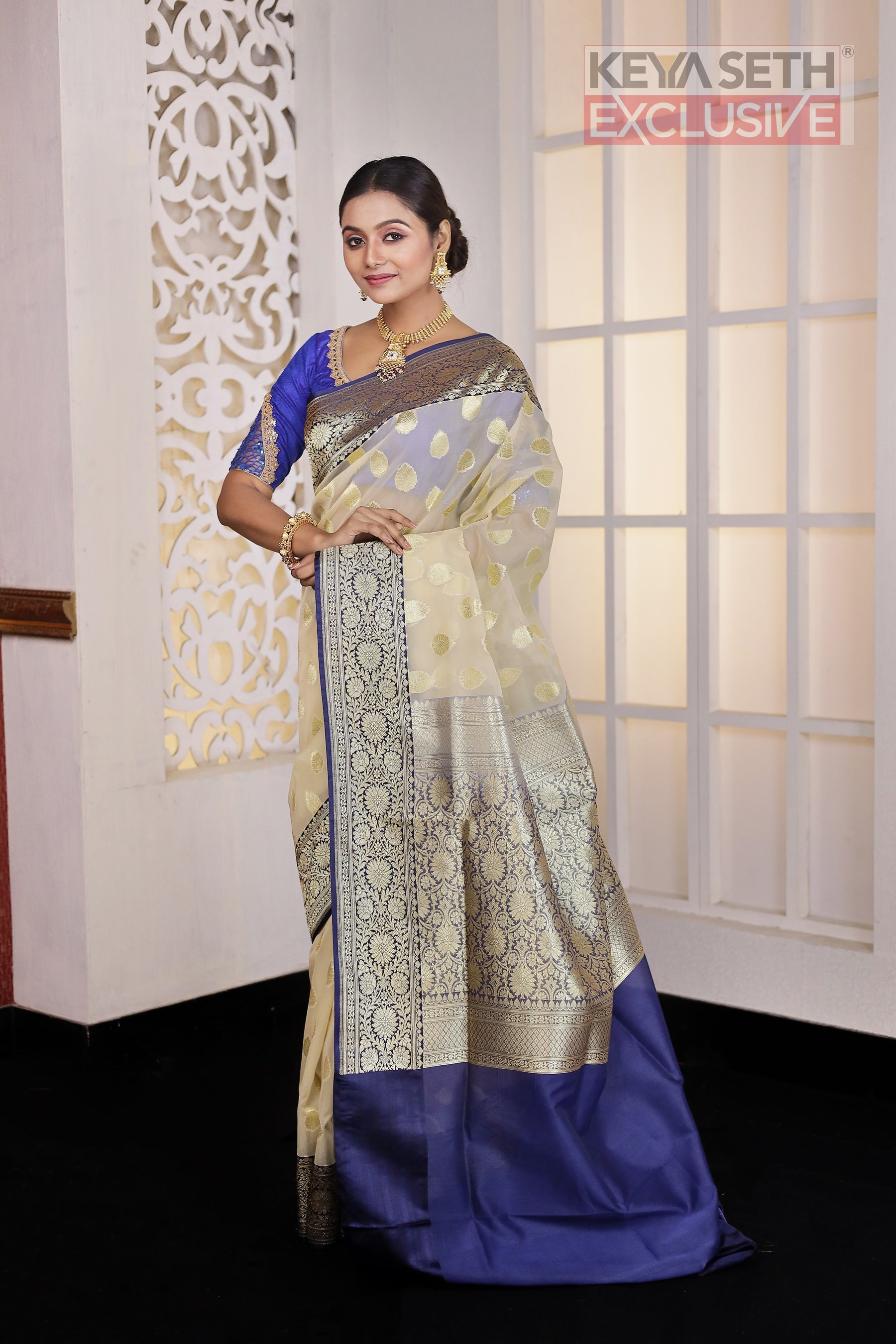 Off-white Soft Tissue Saree with Navy Blue Satin border - Keya Seth Exclusive