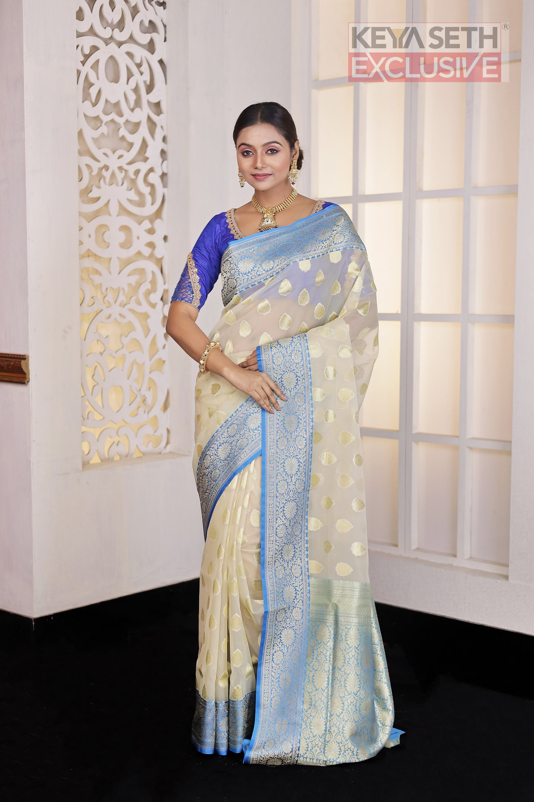 Off-white Soft Tissue Saree with Blue Satin border - Keya Seth Exclusive