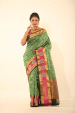Load image into Gallery viewer, GREEN COLOUR EPICAL SILK WITH ALL OVER SELF WEAVING - Keya Seth Exclusive
