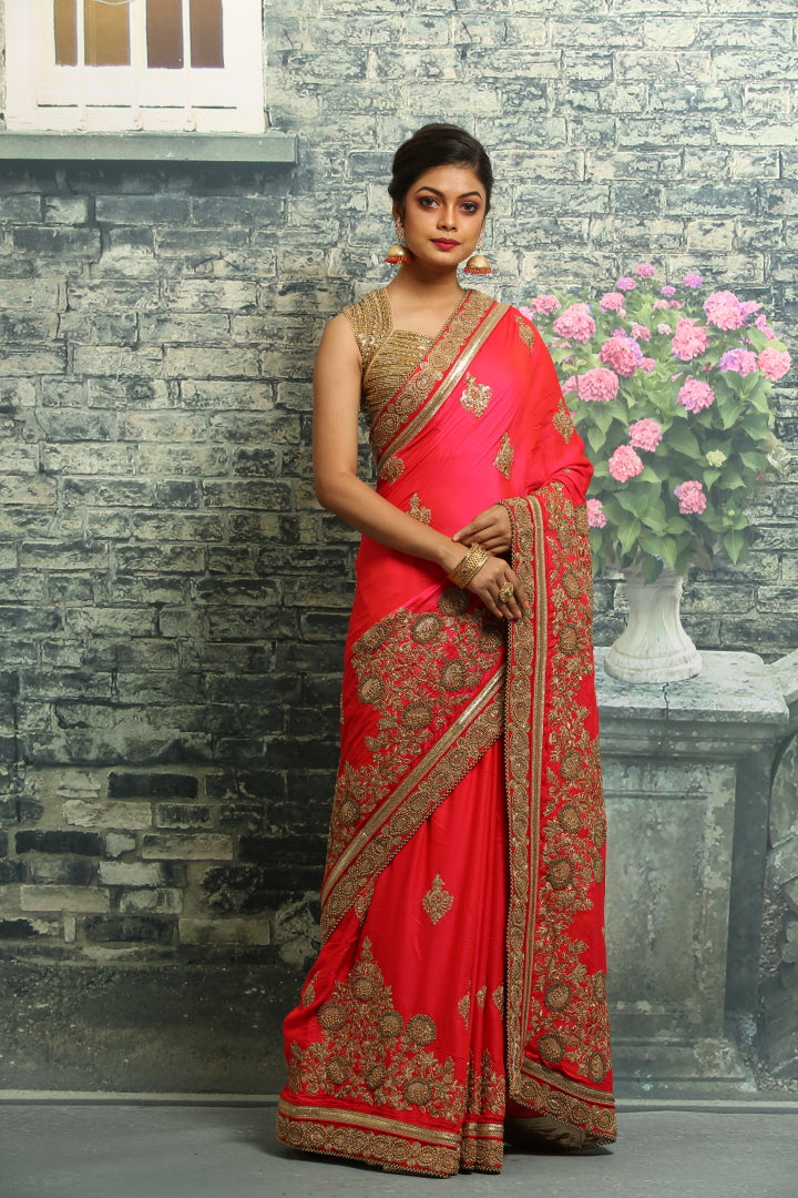 ORANGE COLOUR SILK FANCY SAREE WITH ALL OVER HAND EMBROIDERY HIGHLIGHT