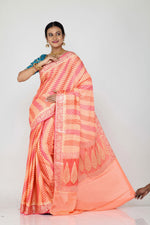 Load image into Gallery viewer,  The lady is wearing a beautiful Khaddi saree